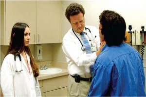 Brian Wispelwey (Division of Infectious Diseases, Department of Medicine), with trainee and patient